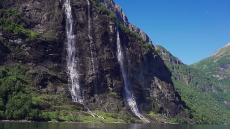 the sven sisters waterfall - an iconic feature of the geiranger fjord, norway