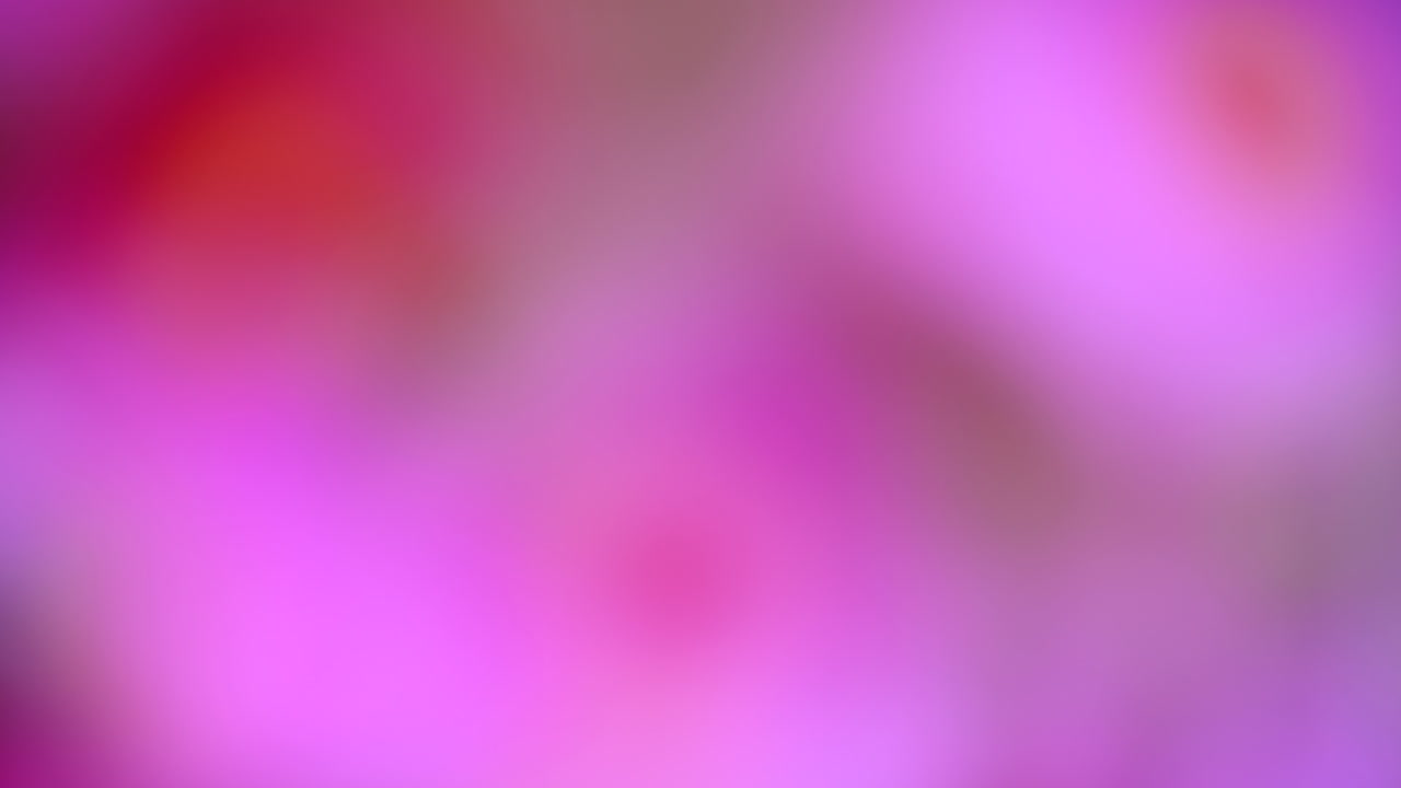 Vibrant blurred background with shades of pink and magenta