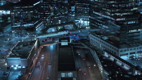 Busy-traffic-at-night-underpass-and-overpass-intersection