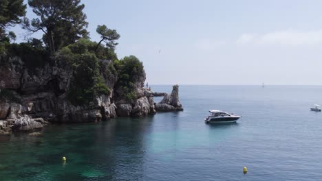 picturesque mediterranean sea cliffs by tropical lagoon on south of france coast, aerial