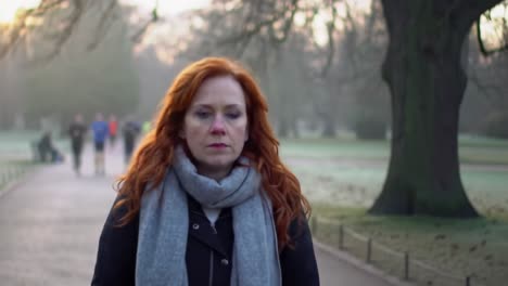 woman walking in a park