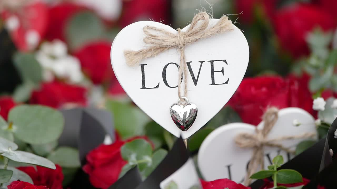 Romantic Bouquet of Red Roses with Heart Decorations