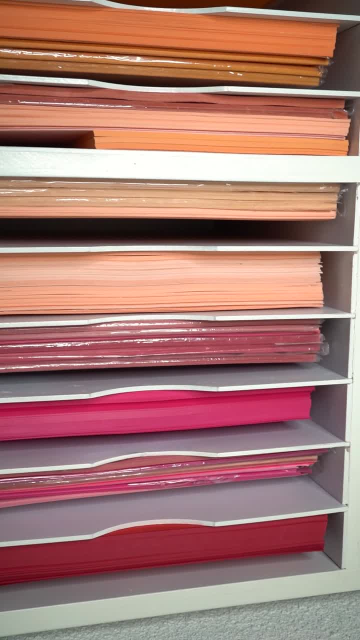 Organized Stacks of Colorful Paper