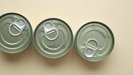 three cans of food