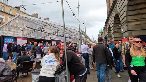 crowds enjoying the festival in edinburgh