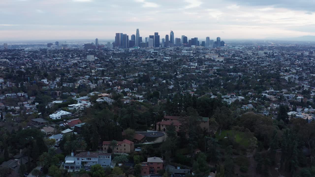 Low aerial descending shot of the historic Paramour Mansion during low light in Hollywood, California. 4K