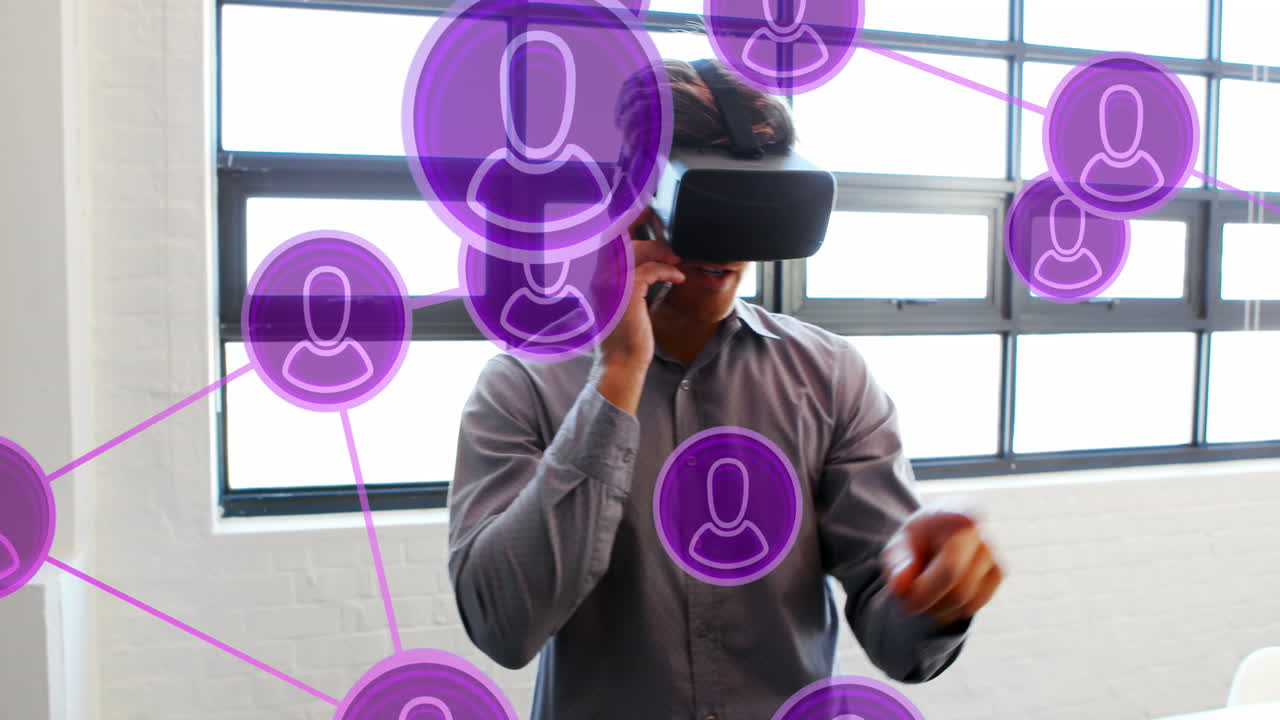 Animation of network of people icons over caucasian businessman in office