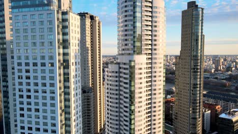 4k aerial drone footage of puerto madero with dolly pull out shot revealing skyscrapers