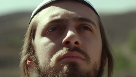 contemplative man looking upwards