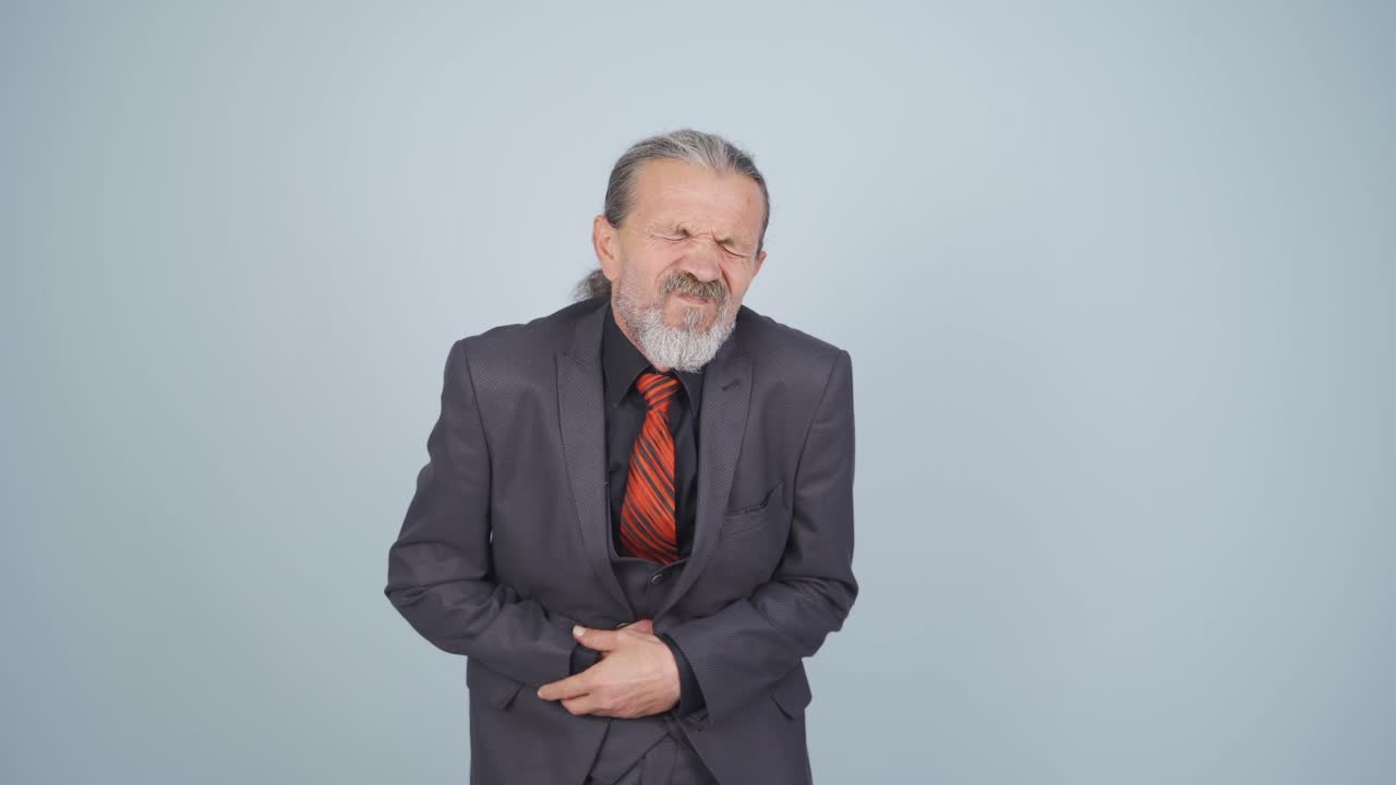 Businessman with stomachache.