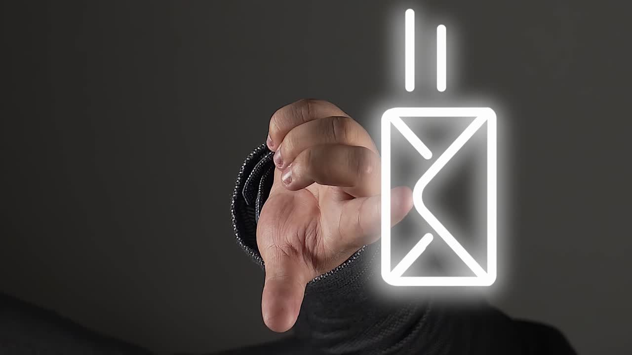 Person showing email icon hologram with his finger, close up view
