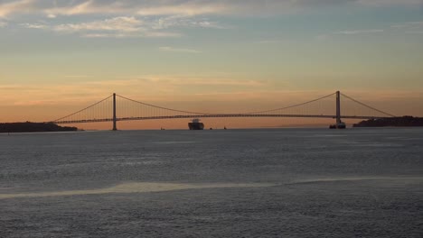 manhattan bridge and brooklyn bridge in new york city, usa. beautiful nyc timelapse. brooklyn bridge with cars in traffic and people. suspension bridge that connects manhattan to brooklyn.