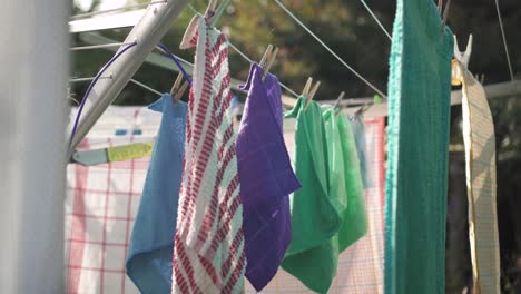 towels pegged onto a clothes line on a sunny day