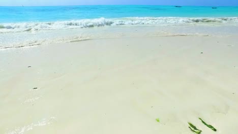 very-beautiful-white-sand-beach-with-a-clean-turquoise-blue-sea-end-waves---slow-motion