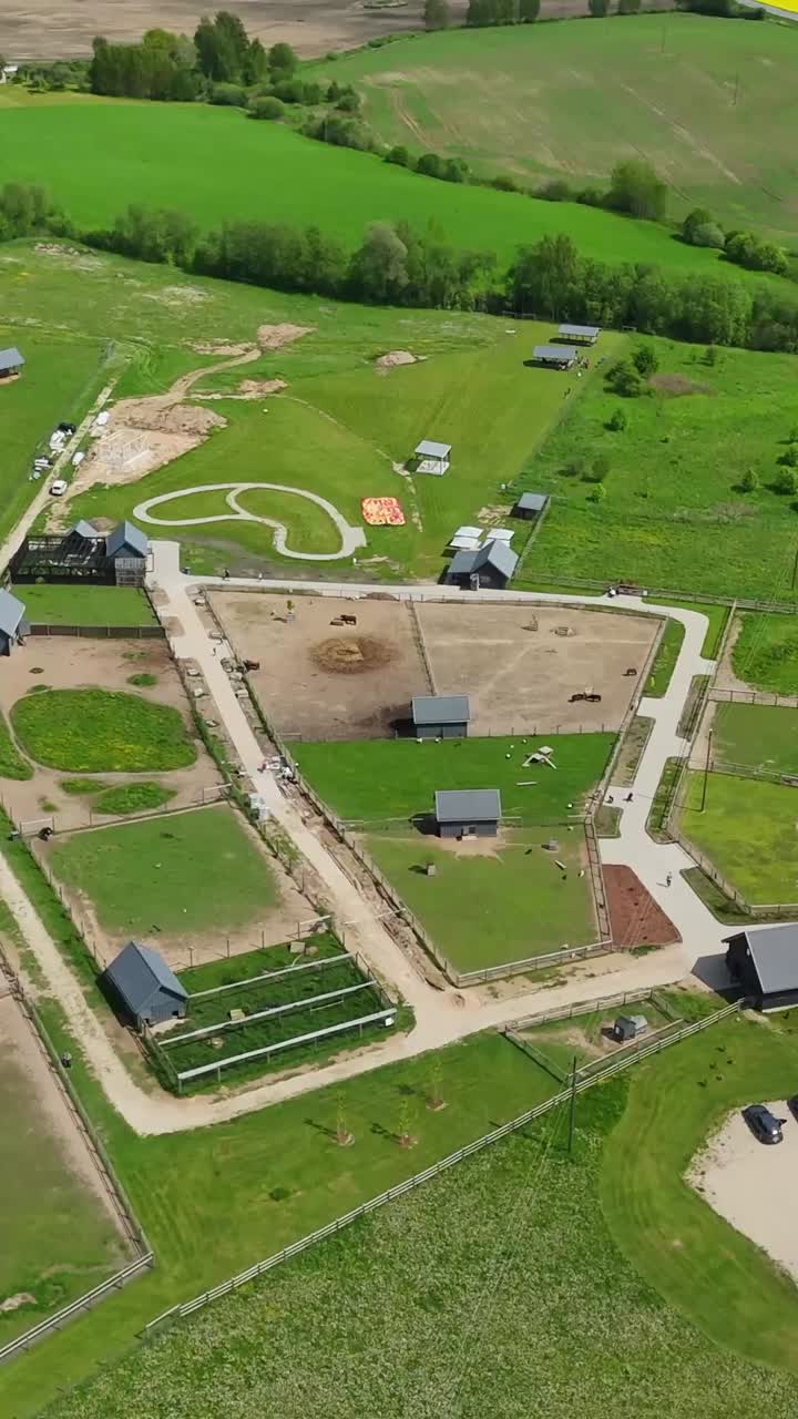 Sigulda Zoo In The Countryside Of Latvia. - aerial vertical shot