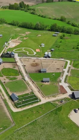 sigulda zoo in the countryside of latvia. - aerial vertical shot