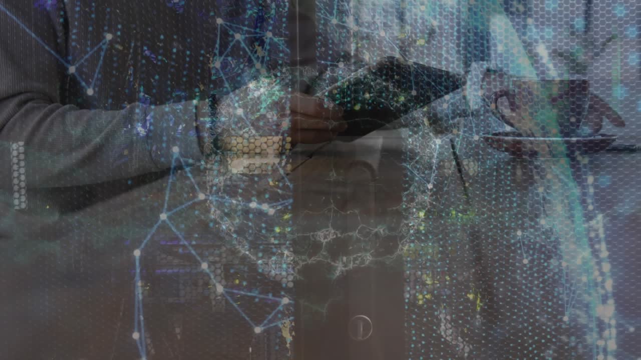 Animation of human brain icon and plexus network over mid section of man using digital tablet