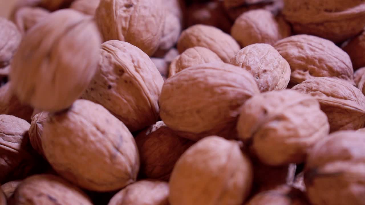 Dried walnuts in a wooden bowl-8