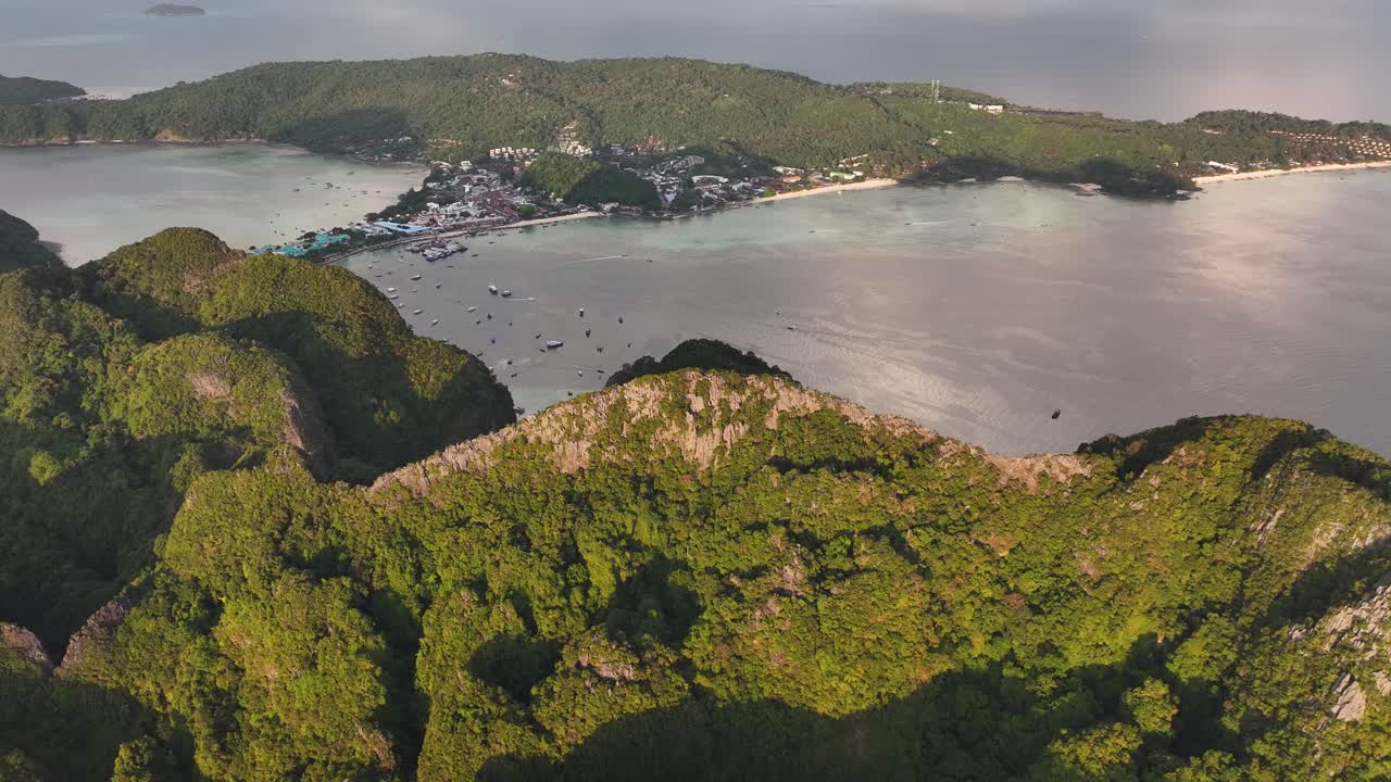 Koh Phi Phi Don Island, Thailand, Drone panoramic, beautiful scenery during sunset, rocky mountain.