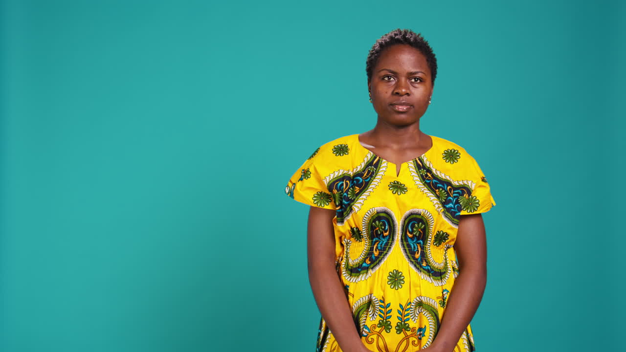 Portrait of natural smiling woman dressed in traditional ethnic clothes