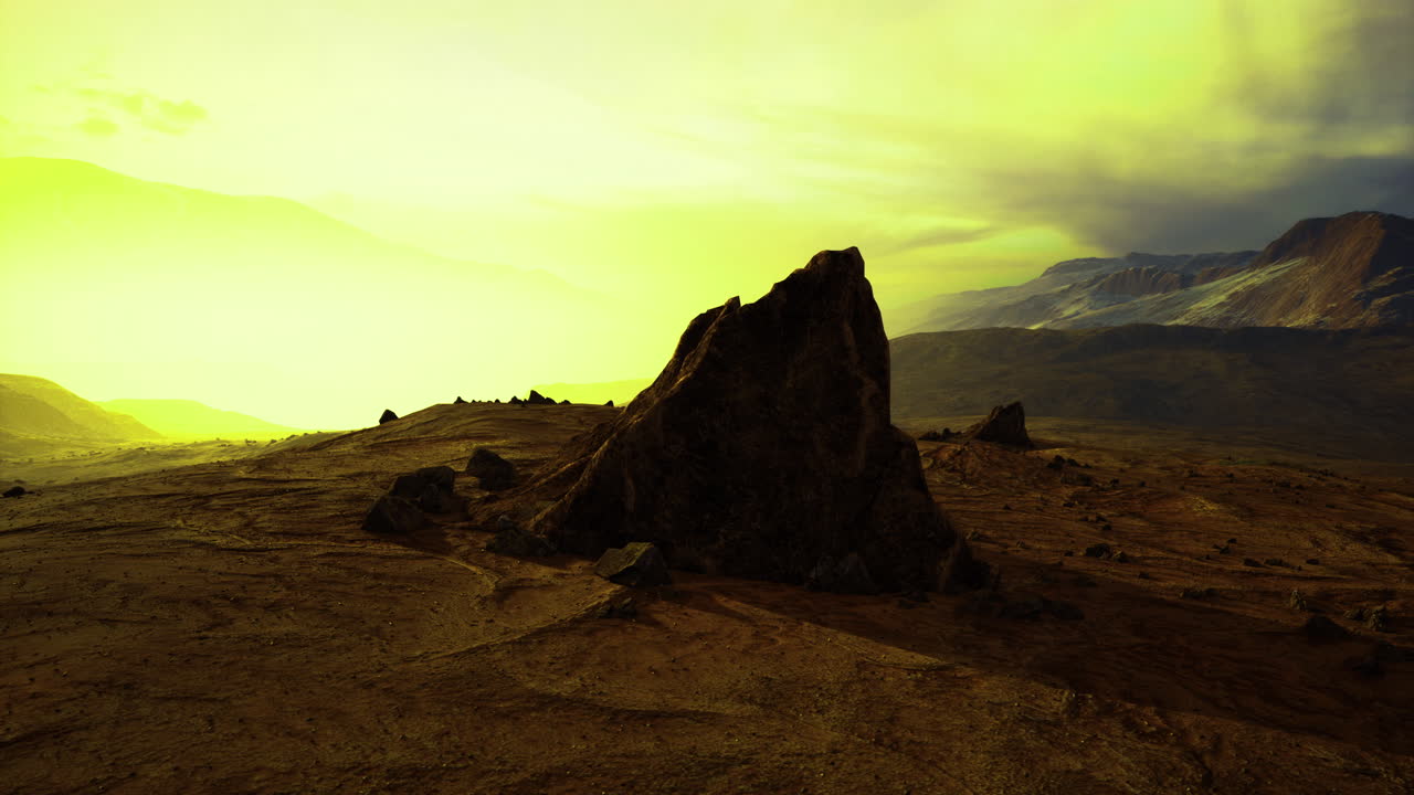 Golden hues fill the air as the sun sets behind distant mountains