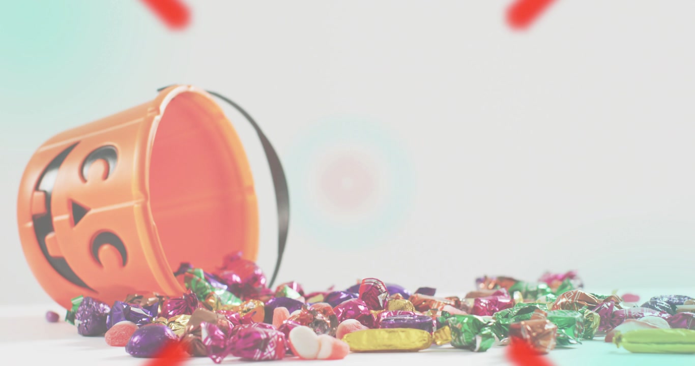 Clip starting with HUD fading in over jack-o'-lantern bucket and candies, rotating circles scanning
