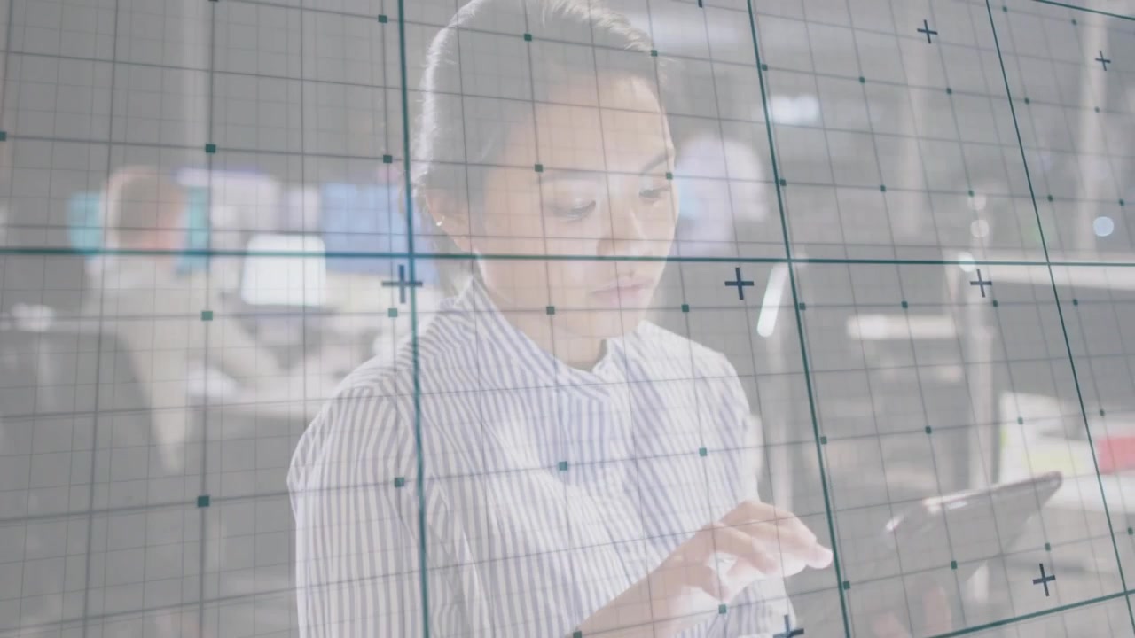 Office professional touching transparent grid then tapping tablet while planning business strategy