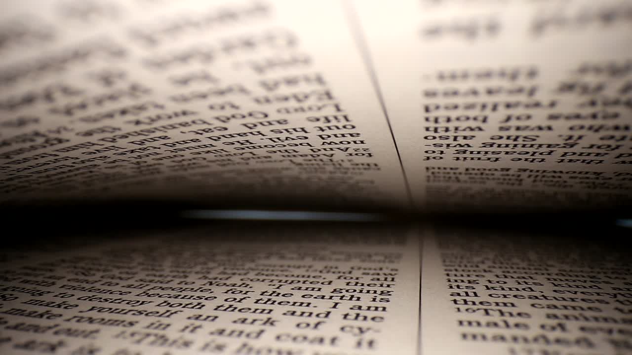 Pushing lens into a book diagonally