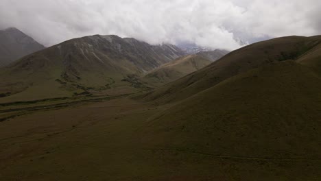 Aerial---gloomy-overcast-weather-in-the-mountains-of-Canterbury,-New-Zealand