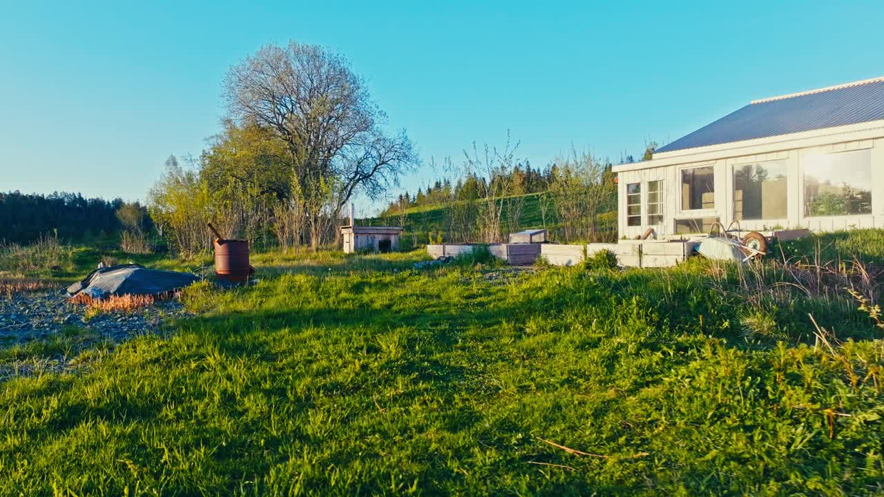 Greenhouse And Farm Field In Rural Norway - Drone Shot