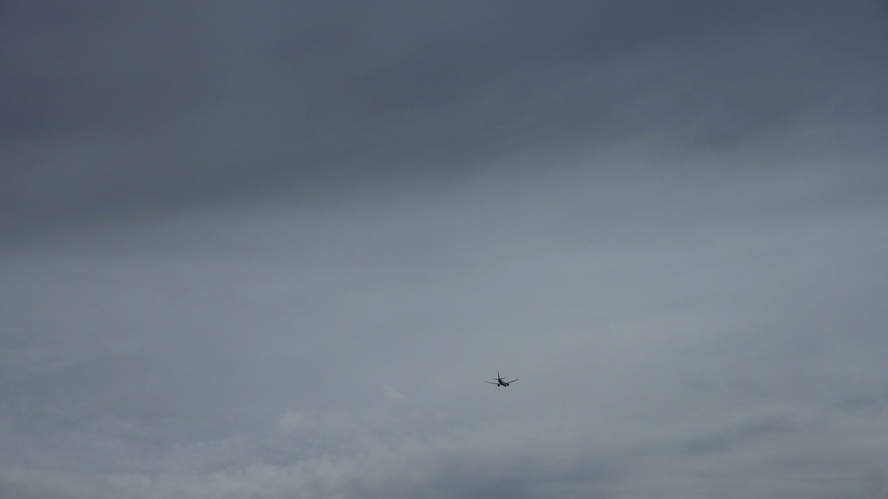 Airplane in a cloudy sky