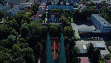 Slow-reveal-shot-of-an-old-medieval-cathedral-spiky-roof