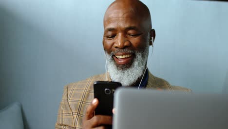 Senior-businessman-talking-on-the-phone-4K-4k