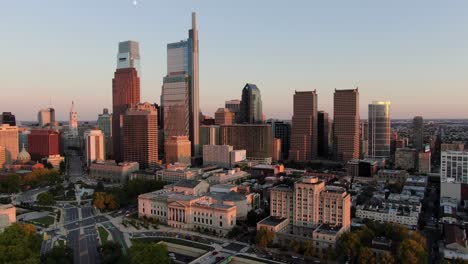 Aerial-of-Philadelphia-Pennsylvania-skyline,-commerce-square-buildings-during-golden-hour-in-summer