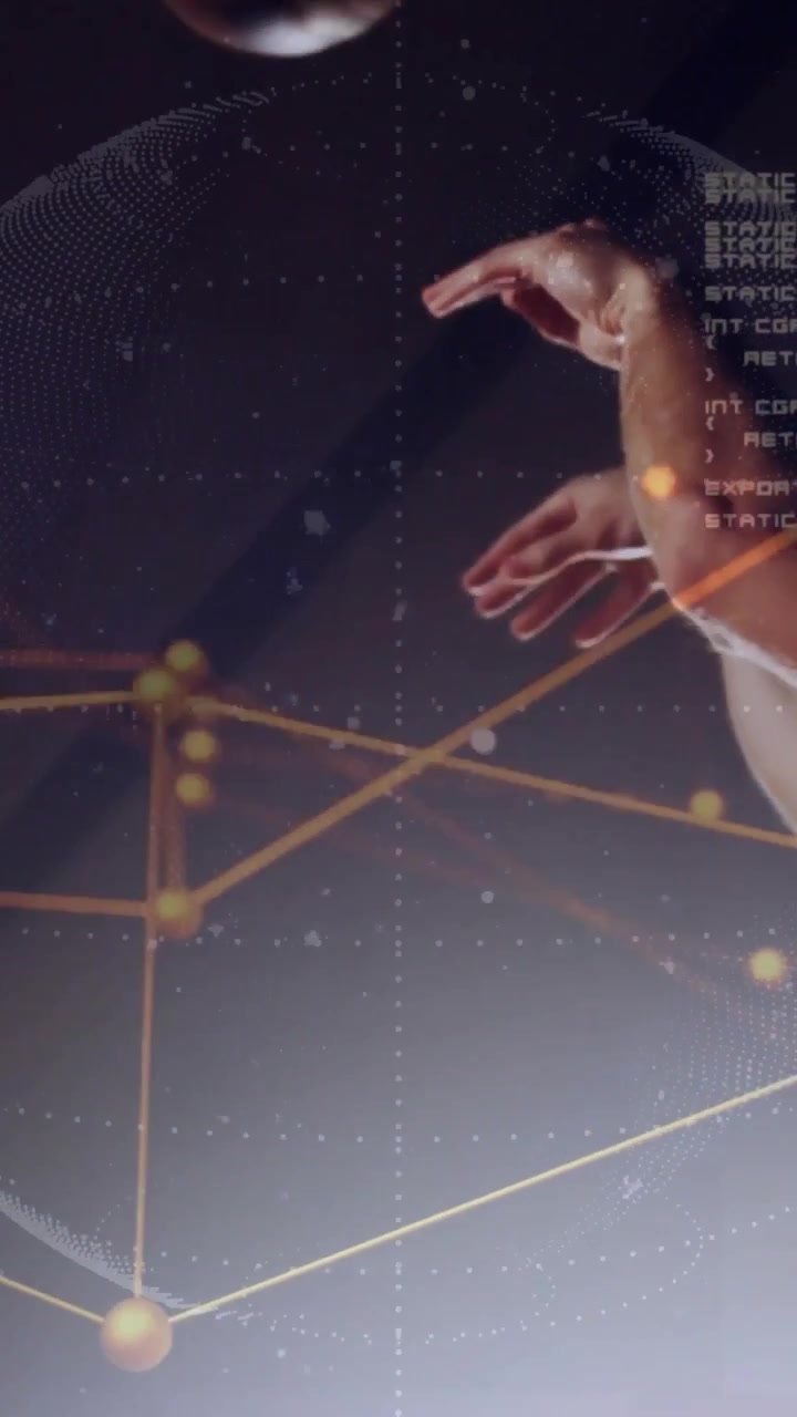 Vertical video: Man's hands entering, gripping ball, lifting, releasing amid dotted globe for tech