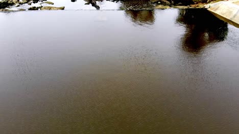 Aerial-video-of-the-river-on-the-way-to-the-dam