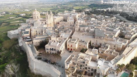 aerial 4k drone footage panning the horizon over a fortified city on the island of malta of the mediterranean sea