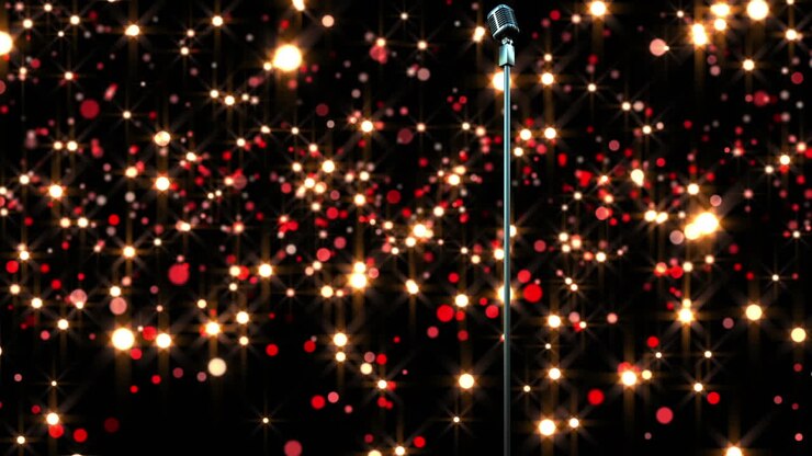 Animation of flying glowing lights over microphone on dark background