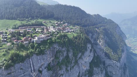 stunning mountain village murren switzerland pull back drone aerial reverse