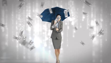 Businesswoman-standing-under-umbrella-