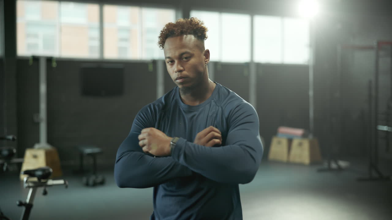 Portrait of a Fit Man in a Gym
