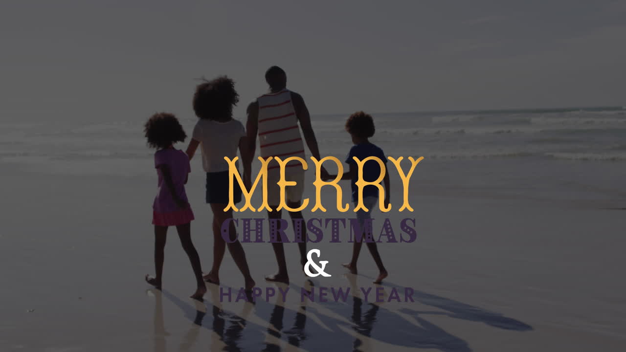 animación de saludos de navidad texto sobre familia afroamericana en la playa.
