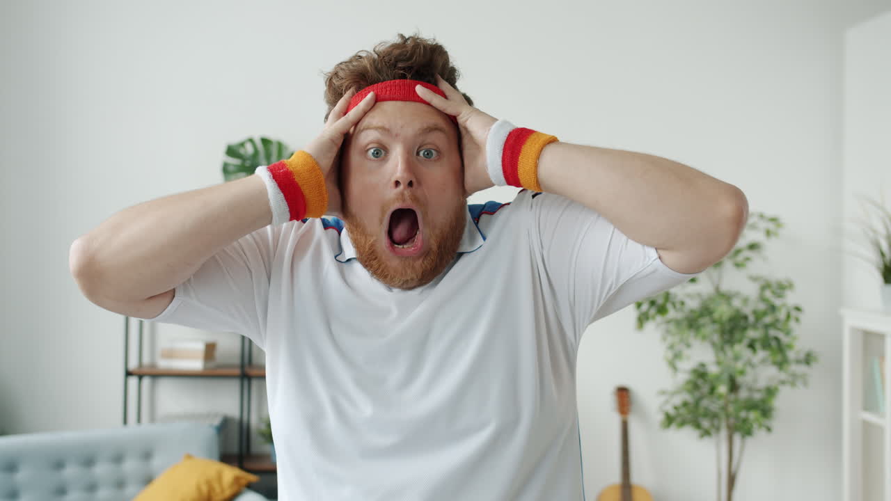 Surprised Man in Retro Sports Outfit