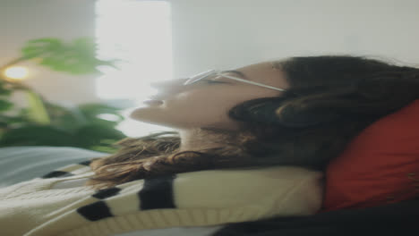 relaxed girl listening to music with headphones