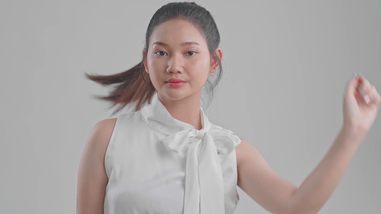 Woman with Long Hair in a White Blouse