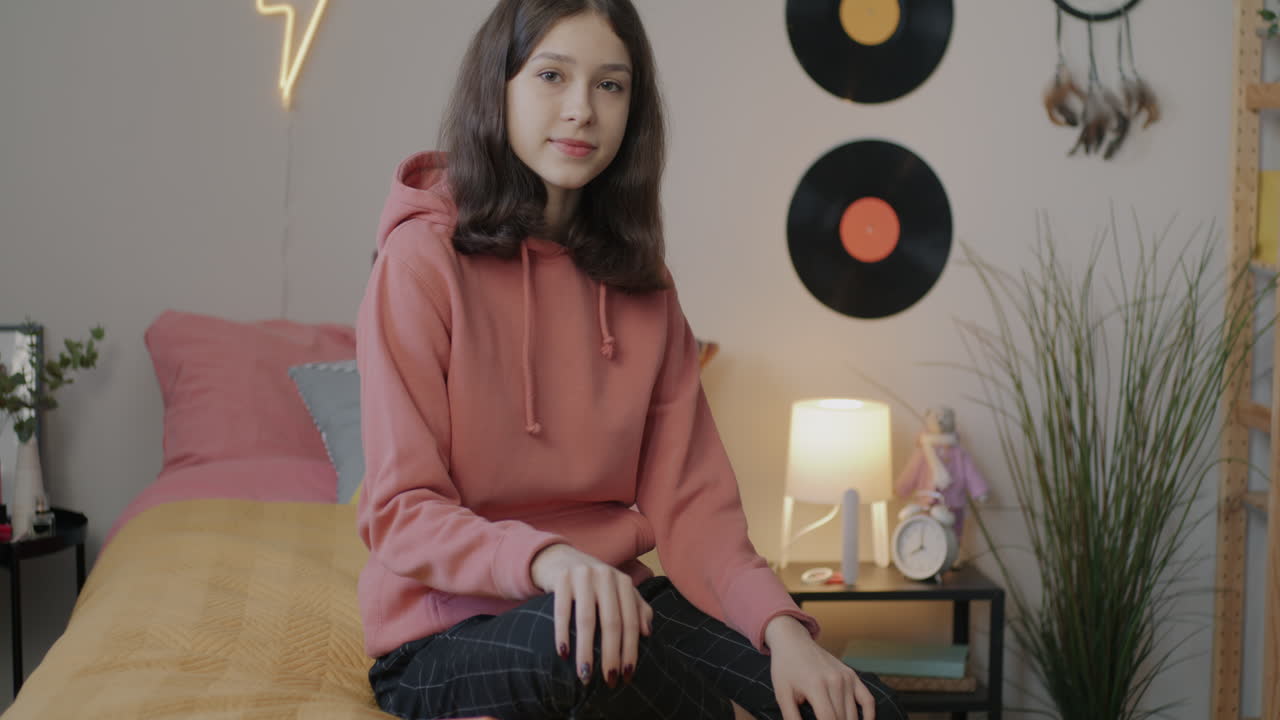 Teenage Girl in Cozy Bedroom