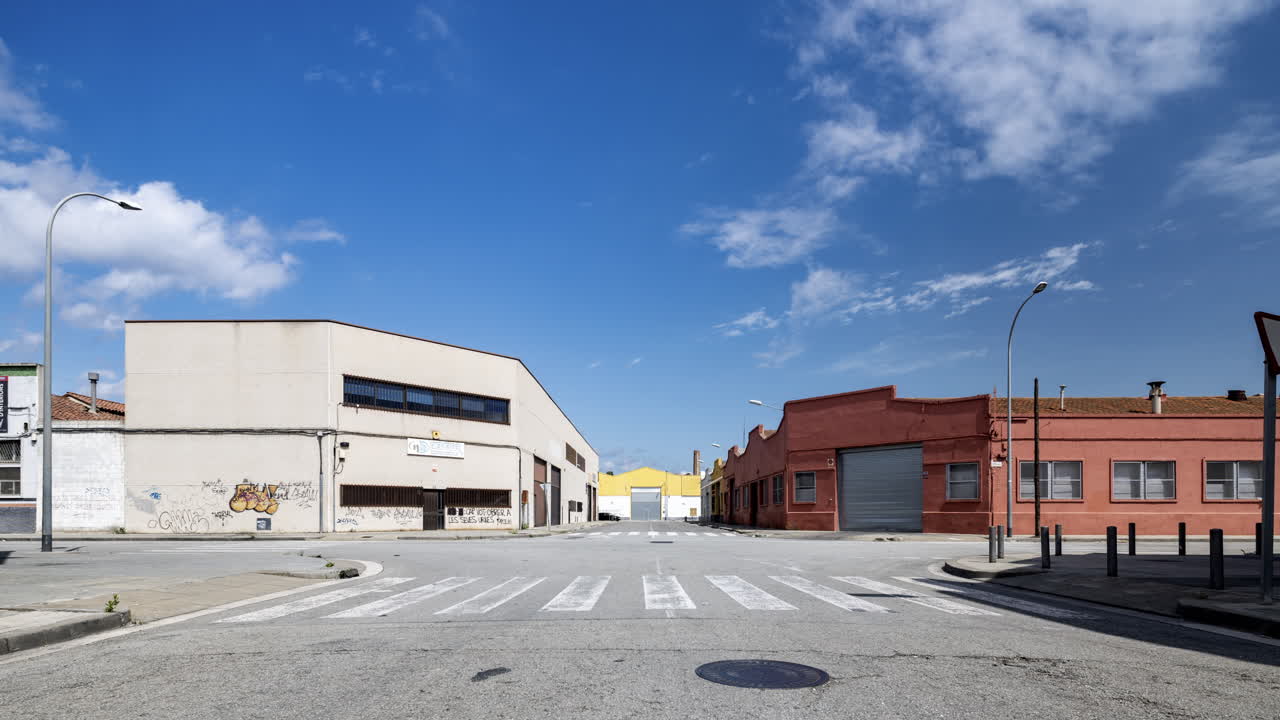 Old factory and industrial complex with passing clouds