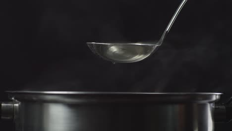 pouring water into a pot