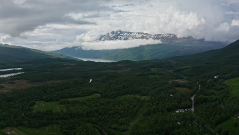 aerial drone over the green majestic landscape in the lofoten islands, norway.