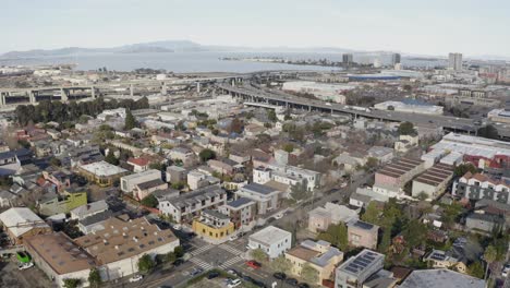 San-Francisco-suburb-over-the-water-dolly-up-4k-aerial